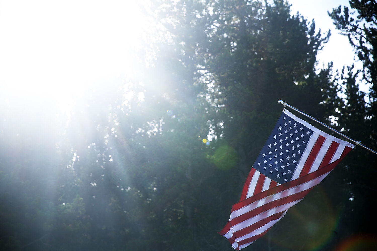 An American flag flies over the Hedlund’s campsite